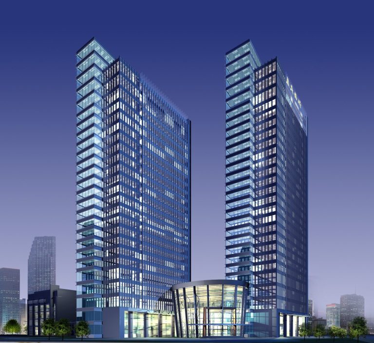 Two modern glass skyscrapers with illuminated facades, set against a twilight sky.